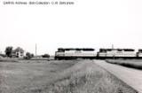 http://www.gn-npjointarchive.org/GNRHSBohi/_t/Denbigh, ND Amtrak 404 with Train 7 and School Look N July 1993 Bohi Photo_jpg.jpg